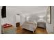 Bright bedroom with hardwood floors and built-in workspace at 7500 E Mccormick Pkwy # 11, Scottsdale, AZ 85258