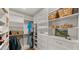 Spacious walk-in closet with ample shelving and drawers at 7500 E Mccormick Pkwy # 11, Scottsdale, AZ 85258
