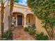Inviting courtyard entry with tile flooring and a comfortable lounge area at 7500 E Mccormick Pkwy # 11, Scottsdale, AZ 85258