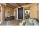 Elegant entryway with a dark wood door and tiled floor at 7500 E Mccormick Pkwy # 11, Scottsdale, AZ 85258