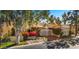 Two-story house with lush landscaping and a two car garage at 7500 E Mccormick Pkwy # 11, Scottsdale, AZ 85258
