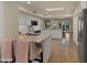 Spacious kitchen with island, stainless steel appliances, and hexagon tile floor at 7500 E Mccormick Pkwy # 11, Scottsdale, AZ 85258