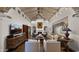 Elegant living room boasts hardwood floors, fireplace, and ample natural light at 7500 E Mccormick Pkwy # 11, Scottsdale, AZ 85258