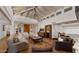 Spacious living room features hardwood floors, high ceilings, and a cozy seating area at 7500 E Mccormick Pkwy # 11, Scottsdale, AZ 85258
