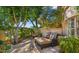 Private patio retreat with comfortable chaise lounge and abundant greenery at 7500 E Mccormick Pkwy # 11, Scottsdale, AZ 85258