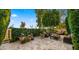 Landscaped patio with fire pit and comfortable seating at 7500 E Mccormick Pkwy # 11, Scottsdale, AZ 85258