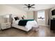 Spacious bedroom with a plush bed and large window at 8375 E Indian School Rd, Scottsdale, AZ 85251