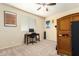 Bedroom with a desk, chair, and bunk beds at 8962 W Adam Ave, Peoria, AZ 85382