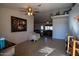 Bright living room with tiled floors and comfortable seating at 9938 E Quarterline Rd, Mesa, AZ 85207