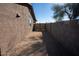 Side yard with block wall and gate at 9938 E Quarterline Rd, Mesa, AZ 85207