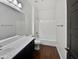 Clean bathroom with tub, shower, and vanity at 10510 E Neville Ave, Mesa, AZ 85209