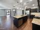 Modern kitchen with a large island and stainless steel appliances at 10510 E Neville Ave, Mesa, AZ 85209