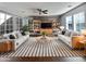 Spacious living room with modern decor and wood-look floors at 10510 E Neville Ave, Mesa, AZ 85209