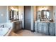 Bathroom with dual vanities and granite countertops at 10532 N Crestview Dr, Fountain Hills, AZ 85268
