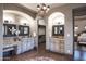 Elegant bathroom with dual vanities, granite counters, and access to a large closet at 10532 N Crestview Dr, Fountain Hills, AZ 85268