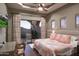 Spacious bedroom with mountain views and private balcony access at 10532 N Crestview Dr, Fountain Hills, AZ 85268