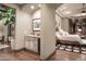 Spacious bedroom with built-in bar and adjacent bathroom at 10532 N Crestview Dr, Fountain Hills, AZ 85268