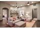 Relaxing game room boasts plush seating, wet bar, and hardwood floors at 10532 N Crestview Dr, Fountain Hills, AZ 85268