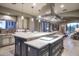 Gourmet kitchen boasts a large island, stainless steel appliances, and custom cabinetry at 10532 N Crestview Dr, Fountain Hills, AZ 85268
