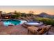 Inviting pool and spa with mountain views and lounge chairs at 10532 N Crestview Dr, Fountain Hills, AZ 85268