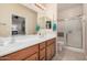 Clean bathroom with double vanity and shower at 10960 E Monte Ave # 125, Mesa, AZ 85209