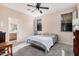 Bright bedroom with carpeted floor and ensuite bathroom at 10960 E Monte Ave # 125, Mesa, AZ 85209