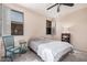 Cozy bedroom with carpeted floor and window shutters at 10960 E Monte Ave # 125, Mesa, AZ 85209