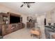 Living room with built-in entertainment center at 10960 E Monte Ave # 125, Mesa, AZ 85209