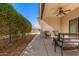 Covered patio with wicker furniture and view of backyard at 10960 E Monte Ave # 125, Mesa, AZ 85209