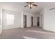 Bright bedroom with large closet and neutral carpeting at 1203 E Muriel Dr, Phoenix, AZ 85022