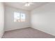 Charming bedroom with window and ceiling fan at 1203 E Muriel Dr, Phoenix, AZ 85022