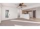 Living room with patio access and kitchen bar at 1203 E Muriel Dr, Phoenix, AZ 85022
