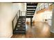 Modern metal staircase with wood flooring, leading to upper level at 1326 N Central Ave # 416, Phoenix, AZ 85004