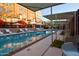 Resort-style pool with shaded seating areas at 1326 N Central Ave # 416, Phoenix, AZ 85004
