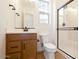 Bright bathroom with wood look flooring and a shower stall at 1350 E Prescott St, Gilbert, AZ 85298