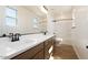 Bright bathroom with wood look flooring and double sink vanity at 1350 E Prescott St, Gilbert, AZ 85298