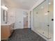 Modern bathroom features sleek vanity, hexagon tile flooring, and frameless glass shower at 1350 E Prescott St, Gilbert, AZ 85298