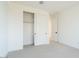 Bright, carpeted bedroom with closet and white trim at 1350 E Prescott St, Gilbert, AZ 85298
