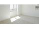 Bright bedroom with carpeted floors and large windows at 1350 E Prescott St, Gilbert, AZ 85298