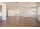 Spacious and bright living room with wood-look tile floors and large windows at 1350 E Prescott St, Gilbert, AZ 85298