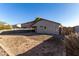 Backyard with patio and block wall at 1628 W San Tan Hills Dr, San Tan Valley, AZ 85144