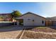 Large backyard with patio and block wall at 1628 W San Tan Hills Dr, San Tan Valley, AZ 85144