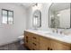 Modern bathroom with double vanity and marble countertops at 1628 W San Tan Hills Dr, San Tan Valley, AZ 85144