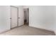 Bright bedroom with neutral carpeting and built-in closet at 1628 W San Tan Hills Dr, San Tan Valley, AZ 85144