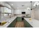 Modern kitchen with green cabinets, white countertops, and island at 1628 W San Tan Hills Dr, San Tan Valley, AZ 85144