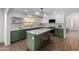 Modern kitchen with green cabinets, white countertops and island at 1628 W San Tan Hills Dr, San Tan Valley, AZ 85144