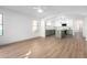 Modern kitchen with green cabinets, quartz countertops, and an island at 1628 W San Tan Hills Dr, San Tan Valley, AZ 85144