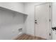 Laundry room with built-in shelving and white cabinetry at 1628 W San Tan Hills Dr, San Tan Valley, AZ 85144