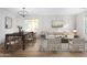 Bright and airy living room with dining area and hardwood floors at 1628 W San Tan Hills Dr, San Tan Valley, AZ 85144