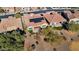 Aerial view of home showcasing solar panels and spacious backyard at 26573 W Abraham Ln, Buckeye, AZ 85396